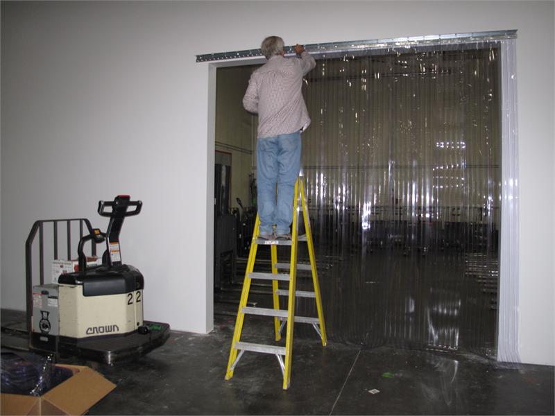 Installation of a Ribbed Strip Curtain.