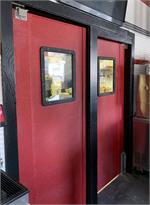 Red Swing Doors For Restaurants- Restaurant kitchen doors with the color red.